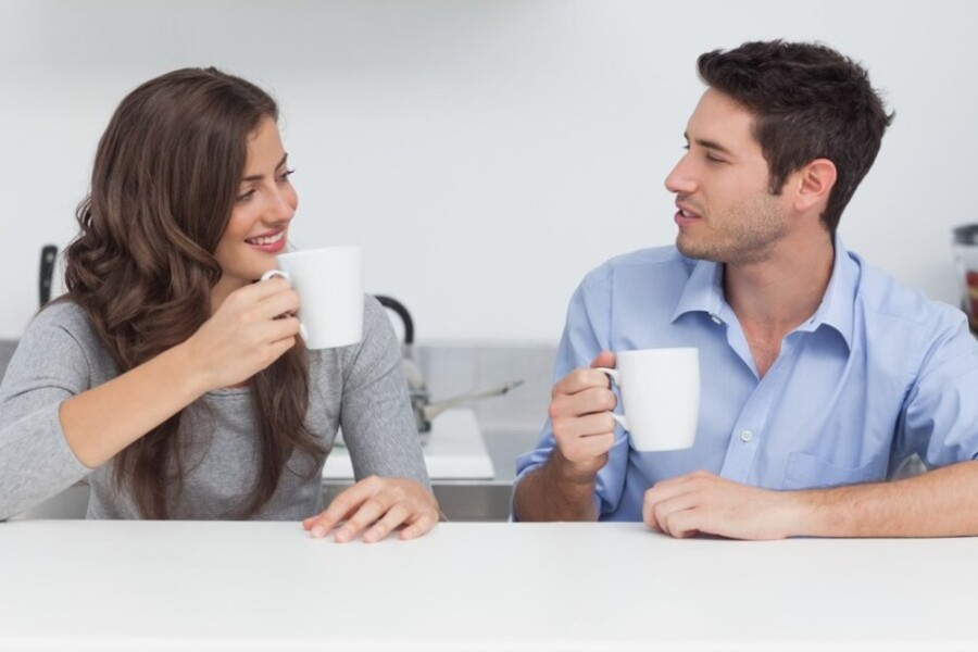 Couple discussing finances together.