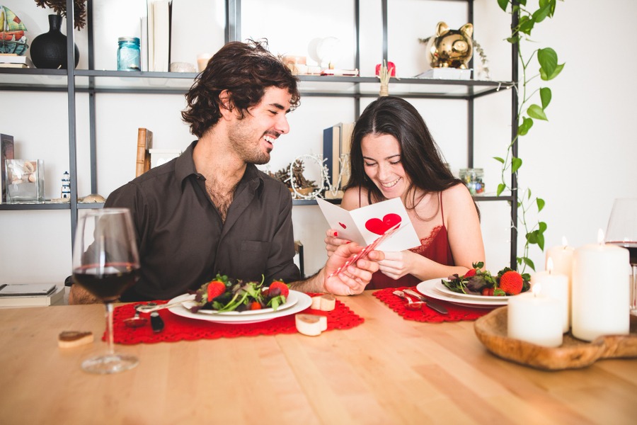 Person making a strong first impression through confident body language and engaging conversation.