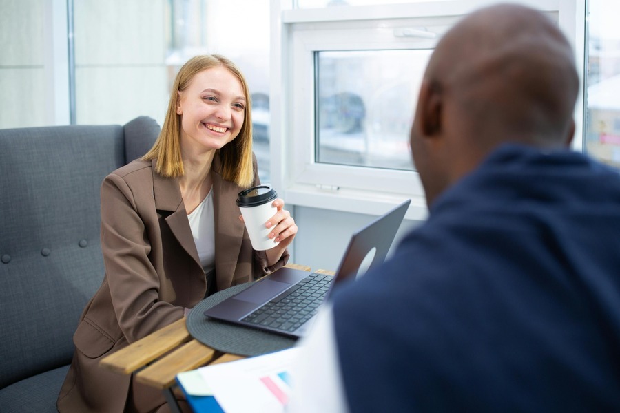Coworkers sharing smiles workplace romance